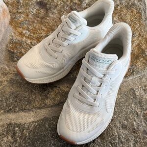 Skechers white slip on sneakers